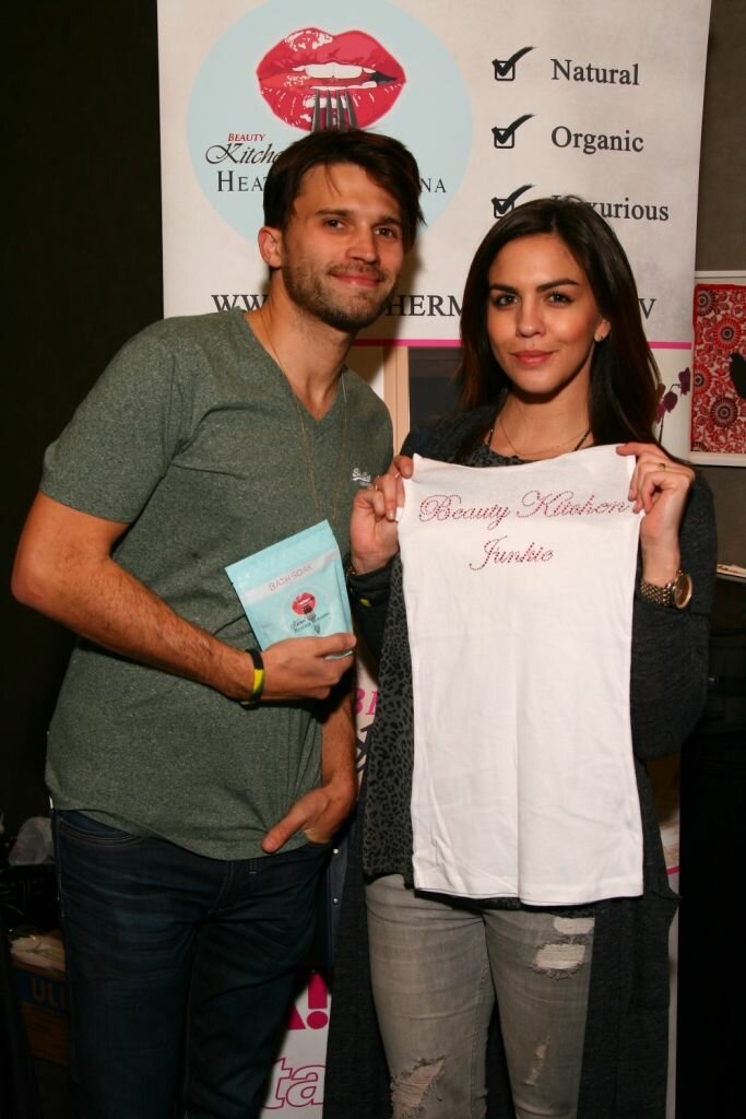 Tom Sandoval and Katie Malone show off Beauty Kitchen tanktop at Golden Globes Gifting Suite