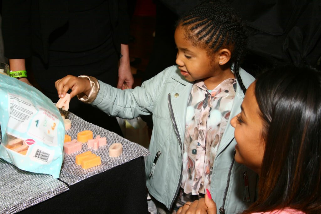 Violet Milian plays with Beauty Kitchen alphabet and number soap